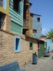 Colourful houses, in tin, wood and brick