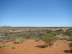 Mt Connor, on the left here, is a table-top mountain not too far from Uluru. It is on private property.