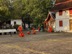 Monks cleaning the court yard