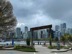 Totem with Downtown Vancouver in the background