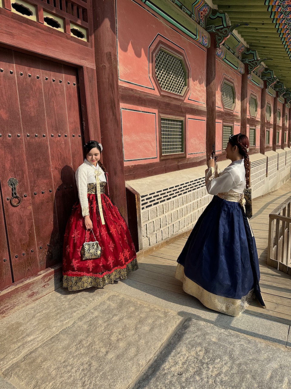 People in Hanbok clothing get in for free